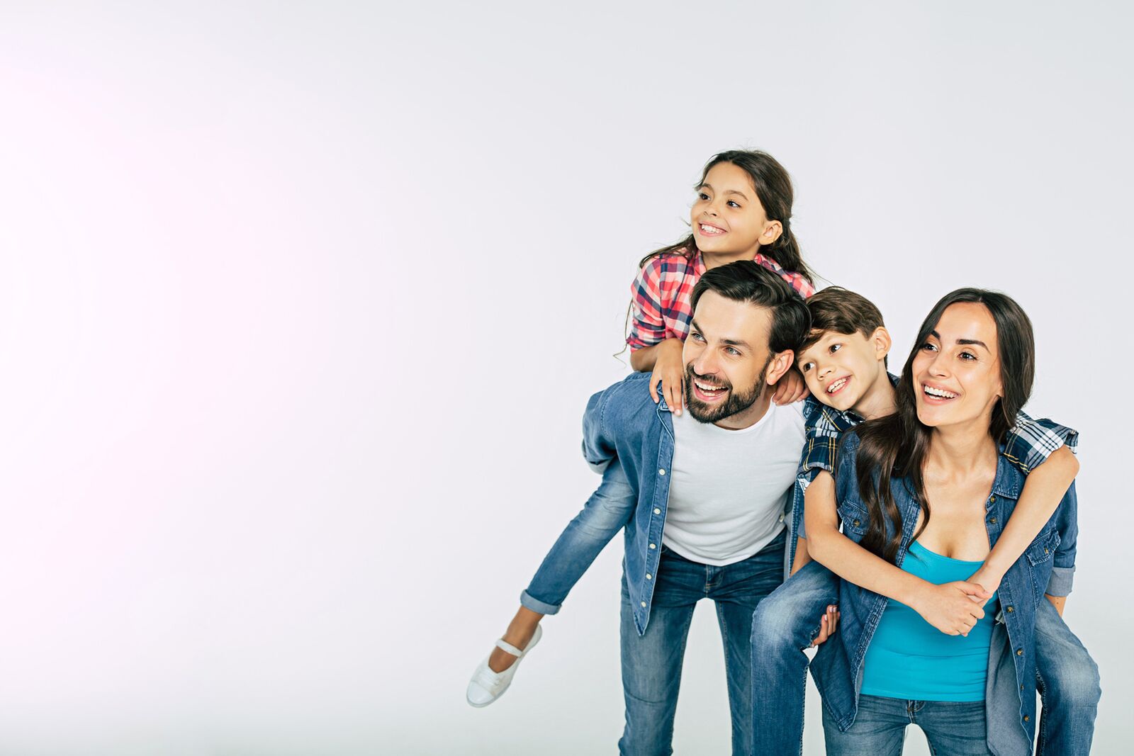 Smiling family of four